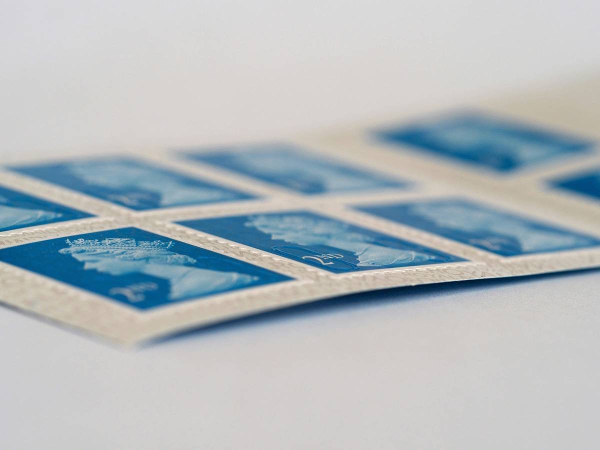 close up, bokeh, macro, blur, blurred background, close focus, stamps, postage stamps, uk postage stamps, 2nd class, second class, second class postage, postal service, letters,